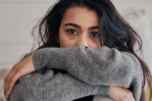 Girl struggling with a mental health crisis.